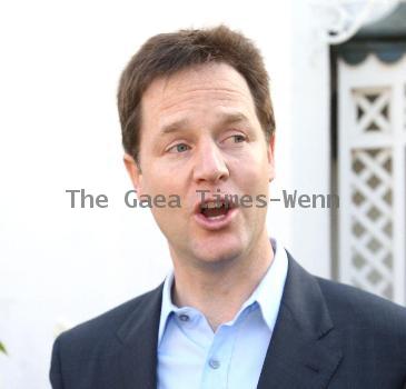 Nick Clegg leaves his house to make a statement regarding the U.K. General Elections in front of the press London.