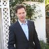 Nick Clegg leaves his house to make a statement regarding the U.K. General Elections in front of the press London.