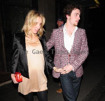 Sam Taylor-Wood and Aaron Johnson leaving Claridges hotel 
London, England.