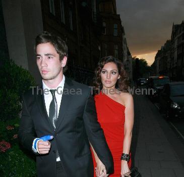 Danny Cipriani and Kelly Brook 
arriving at Claridges hotel in Mayfair. Danny appears to be sporting a rugby injury with his thumb in a bandage. 
London, England.