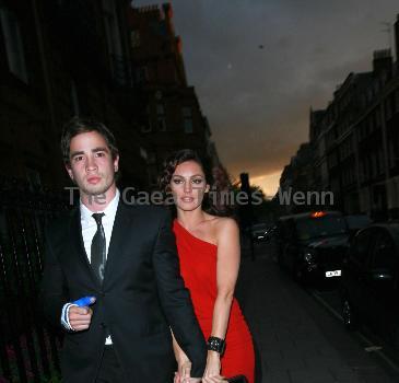 Danny Cipriani and Kelly Brook 
arriving at Claridges hotel in Mayfair. Danny appears to be sporting a rugby injury with his thumb in a bandage. 
London, England.