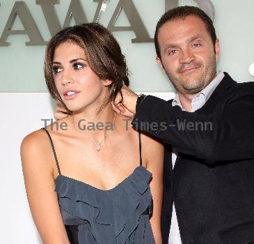 Hope Dworaczyk and Pascal Mouwad
 Playmate of the year 2010, Hope Dworaczyk, receives a new Bunny diamond necklace designed by Pascal Mouwad at his showroom 
Los Angeles, California.