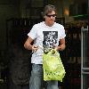 Richard Madeley 
is greeted by Kim Medcalf while out shopping in Golders Green.
London, England.