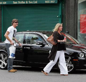 Richard Madeley 
is greeted by Kim Medcalf while out shopping in Golders Green.
London, England.