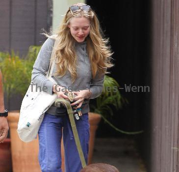 'Letters to Juliet' star Amanda Seyfried, wearing no makeup, leaves her West Hollywood gym with her dogLos Angeles.