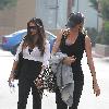 Gisele Bundchen and fellow Brazilian model Camila Alves leaving a local gym after an early workout date in Studio CityLos Angeles.