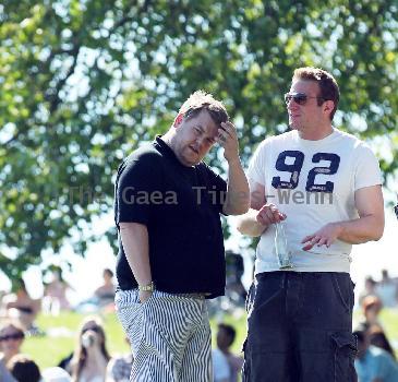 James Corden and Julia Carey
embrace while spending an afternoon relaxing with friends in Primrose Hill park
London, England.