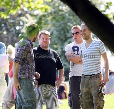 James Corden and Julia Carey
embrace while spending an afternoon relaxing with friends in Primrose Hill park
London, England.