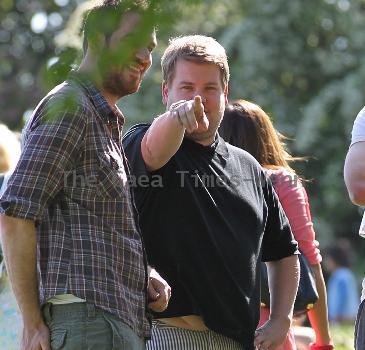 James Corden and Julia Carey
embrace while spending an afternoon relaxing with friends in Primrose Hill park
London, England.