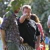 James Corden and Julia Carey
embrace while spending an afternoon relaxing with friends in Primrose Hill park
London, England.