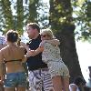 James Corden and Julia Carey
embrace while spending an afternoon relaxing with friends in Primrose Hill park
London, England.