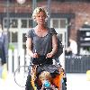 Gretchen Mol pushing her son, Ptolemy John Williams, in a stroller while out and about in SoHo New York City.