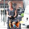 Gretchen Mol pushing her son, Ptolemy John Williams, in a stroller while out and about in SoHo New York City.