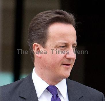 Prime Minister David Cameron
leaving his house wearing a Paul Smith