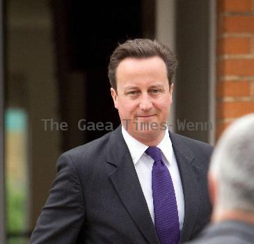 Prime Minister David Cameron
leaving his house wearing a Paul Smith