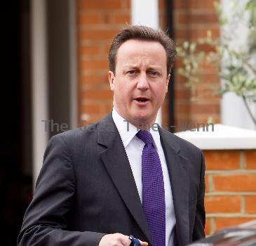 Prime Minister David Cameron
leaving his house wearing a Paul Smith