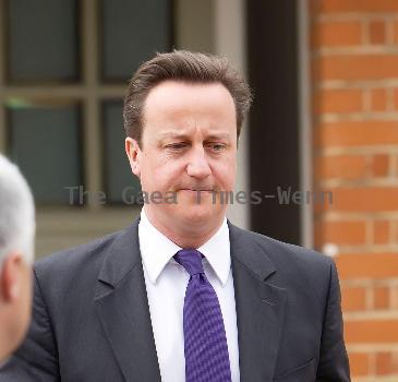 Prime Minister David Cameron
leaving his house wearing a Paul Smith