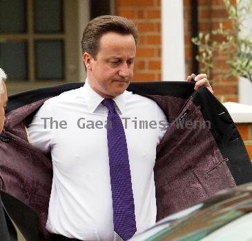 Prime Minister David Cameron
leaving his house wearing a Paul Smith