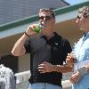 BEERS BROSNAN Former James Bond star Pierce Brosnan indulges in a cold beer on a sunny day in Malibu. The actor, immortalised as the trim superspy in 007 films including Die Another Day, is snapped holding his hand over what appears to be a bulging belly.Los Angeles.