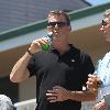 BEERS BROSNAN Former James Bond star Pierce Brosnan indulges in a cold beer on a sunny day in Malibu. The actor, immortalised as the trim superspy in 007 films including Die Another Day, is snapped holding his hand over what appears to be a bulging belly.Los Angeles.