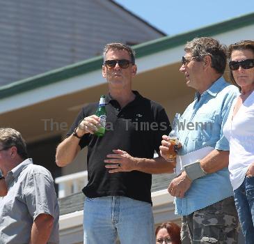 BEERS BROSNAN Former James Bond star Pierce Brosnan indulges in a cold beer on a sunny day in Malibu. The actor, immortalised as the trim superspy in 007 films including Die Another Day, is snapped holding his hand over what appears to be a bulging belly.Los Angeles.