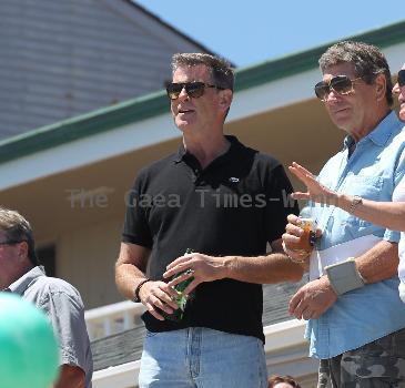 BEERS BROSNAN Former James Bond star Pierce Brosnan indulges in a cold beer on a sunny day in Malibu. The actor, immortalised as the trim superspy in 007 films including Die Another Day, is snapped holding his hand over what appears to be a bulging belly.Los Angeles.