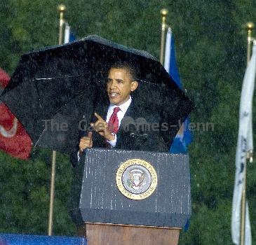 Torrential rain, lightning, thunder and strong winds forced President Barack Obama to cancel a Memorial Day speech he'd scheduled at the Abraham Lincoln National Cemetery.  Obama had mounted the podium to give the address when rain, thunder, lightning and high winds  began. Under the cover of a large umbrella, he told thousands gathered before him that