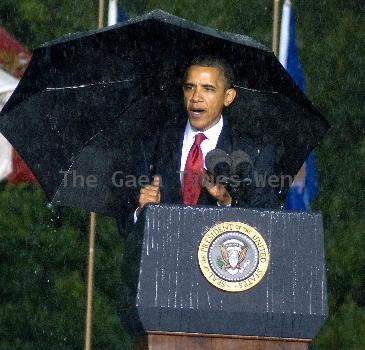 Torrential rain, lightning, thunder and strong winds forced President Barack Obama to cancel a Memorial Day speech he'd scheduled at the Abraham Lincoln National Cemetery.  Obama had mounted the podium to give the address when rain, thunder, lightning and high winds  began. Under the cover of a large umbrella, he told thousands gathered before him that