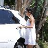 Halle Berry carries her sleeping daughter, Nahla Ariela Aubry, to attend a pool party in Hollywood Hills Los Angeles.