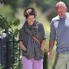 Marisa Tomei, wearing no makeup and sporting a rather noticeable love bite on her neck, walking with a friend in Hollywood. Los Angeles.