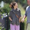 Marisa Tomei, wearing no makeup and sporting a rather noticeable love bite on her neck, walking with a friend in Hollywood. Los Angeles.