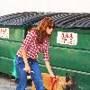 Eva Mendes, wearing plaid and jeans, walking her dog in Beverly Hills Los Angeles.