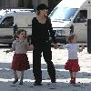 Elen Rives The ex girlfriend of football player Frank Lampard, with their daughters Luna and Isla, enjoying a stroll and ice cream on a sunny day in Chelsea. London.