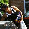 Peter Andre returns to his new house after buying some groceries from the local village store. Hove.