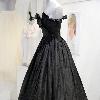 Passion For Fashion And Fine Textiles - AuctionThe Emanuel black taffeta gown worn by Lady Diana Spencer for her first offical appearance with her then Fiance HRH Prince Charles in 1981.Today the dress is auctioned and estimated  at £30-50,000. being auctioned today by Kerry Taylor Auctions. London.