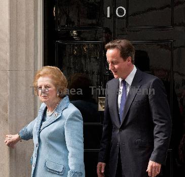 Margaret Thatcher, David Cameron Former British Conservative Prime Minster  Baroness Thatcher being greeted, on the door step of 10 Downing Street in London, by the current UK Prime Minister David Cameron. London.