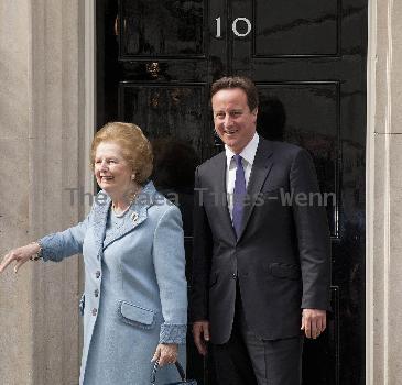 Margaret Thatcher, David Cameron Former British Conservative Prime Minster  Baroness Thatcher being greeted, on the door step of 10 Downing Street in London, by the current UK Prime Minister David Cameron. London.