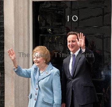 Margaret Thatcher, David Cameron Former British Conservative Prime Minster  Baroness Thatcher being greeted, on the door step of 10 Downing Street in London, by the current UK Prime Minister David Cameron. London.