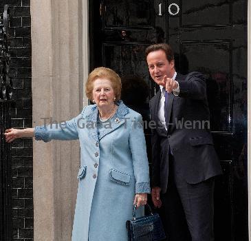 Margaret Thatcher, David Cameron Former British Conservative Prime Minster  Baroness Thatcher being greeted, on the door step of 10 Downing Street in London, by the current UK Prime Minister David Cameron. London.