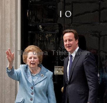 Margaret Thatcher, David Cameron Former British Conservative Prime Minster  Baroness Thatcher being greeted, on the door step of 10 Downing Street in London, by the current UK Prime Minister David Cameron. London.