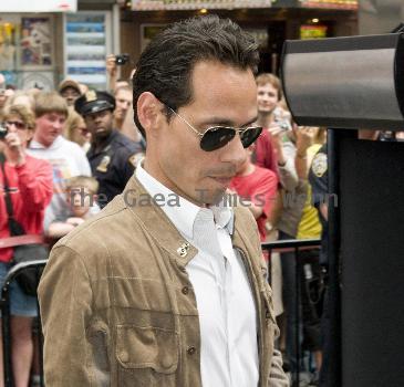 Jennifer Lopez and Marc Anthony attend the unveiling of 'Be Extraordinary' billboard in Times Square New York City.