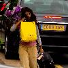 Konnie Huq The former Blue Peter presenter is the new host of ITV2's spin off show The Xtra Factor. Konnie with her hands full, carrying a suitcase, yellow selfridges bag, a bouquet of flowers, returns home from Glasgow, where auditions have begun. London.