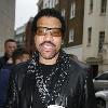 Lionel Richie arriving back at his hotel with hot beverageLondon.