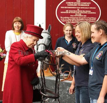 Queen Elizabeth II tours the gardens at Capel Manor College in Enfield, Middlesex, where she opened the Queen Elizabeth, Queen Mother Centenary Garden and met with staff and students. London.