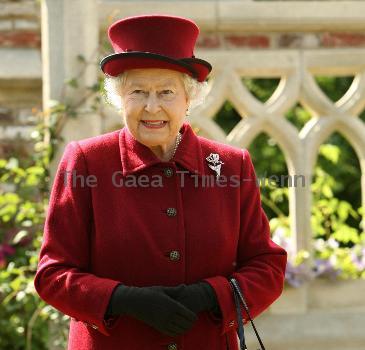 Queen Elizabeth II tours the gardens at Capel Manor College in Enfield, Middlesex, where she opened the Queen Elizabeth, Queen Mother Centenary Garden and met with staff and students. London.