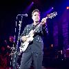 Singer Chris Isaak performing on stage during a concert Shepherds Bush Empire. The concert is part of the 2010 tour to promote his album 'Mr. Lucky'London.