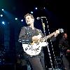 Singer Chris Isaak performing on stage during a concert Shepherds Bush Empire. The concert is part of the 2010 tour to promote his album 'Mr. Lucky'London.