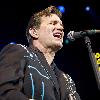 Singer Chris Isaak performing on stage during a concert Shepherds Bush Empire. The concert is part of the 2010 tour to promote his album 'Mr. Lucky'London.