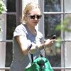 Amanda Seyfried carrying a green gym bag while leaving a friend's house in West Hollywood Los Angeles.