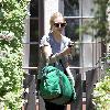 Amanda Seyfried carrying a green gym bag while leaving a friend's house in West Hollywood Los Angeles.